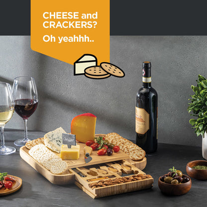 Engraved bamboo cheese board with knife drawer open