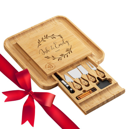 Charcuterie board wrapped as a gift with a bow