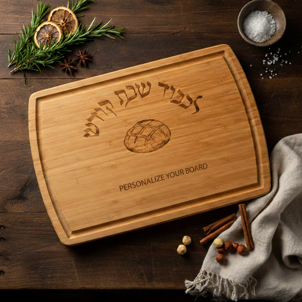 Personalized bamboo challah board engraved with a family name